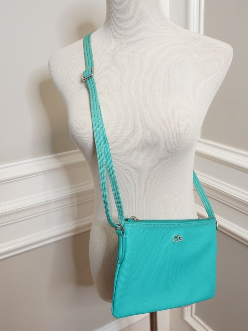 Lacoste Teal crossover bag PVC w/leather trimming